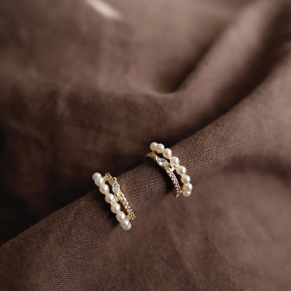 P134 zirconia and pearl half foop pierce