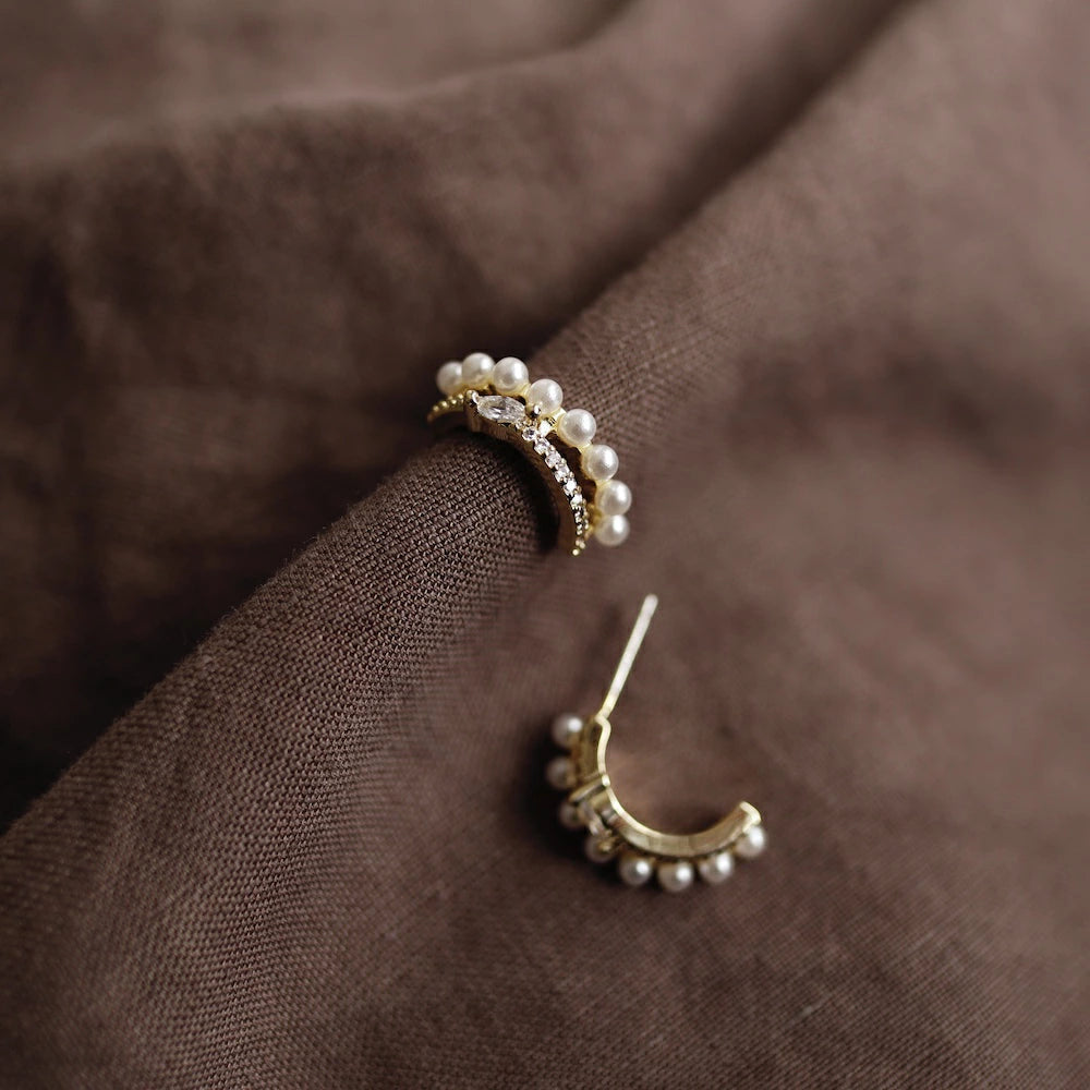 P134 zirconia and pearl half foop pierce
