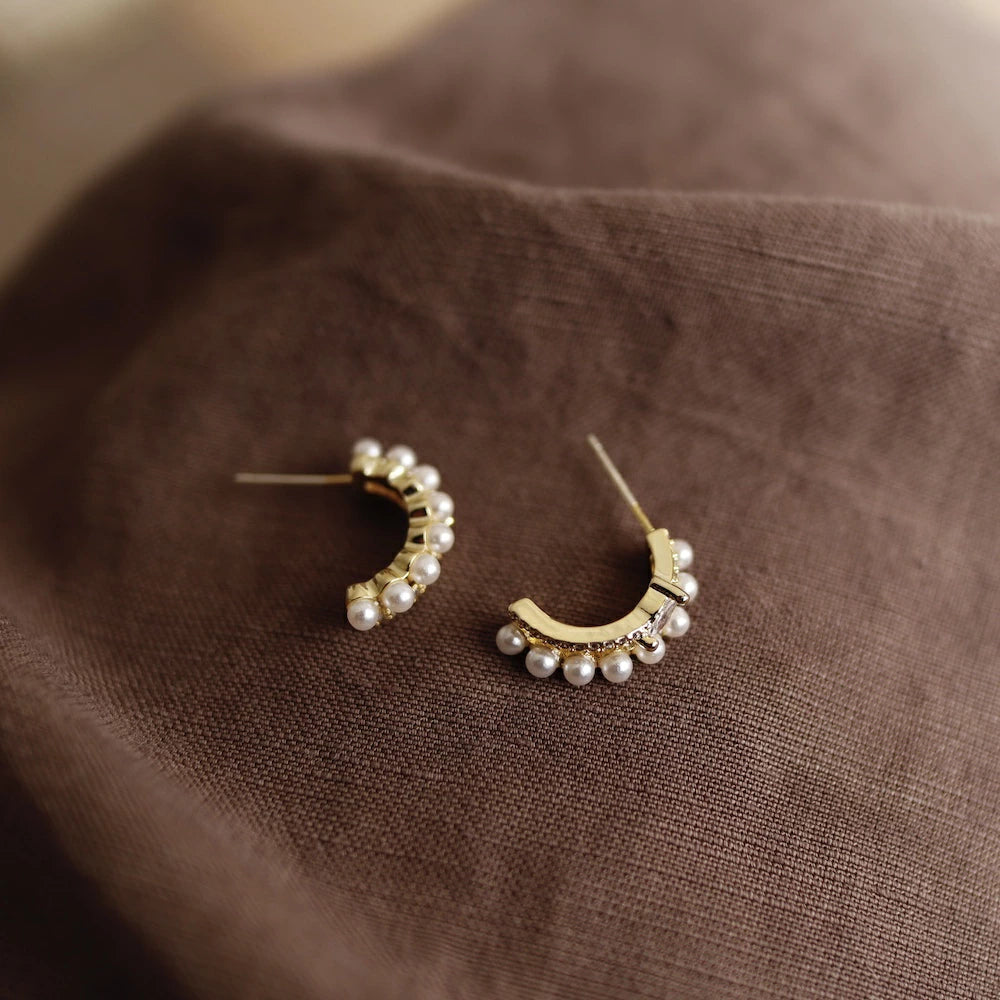 P134 zirconia and pearl half foop pierce