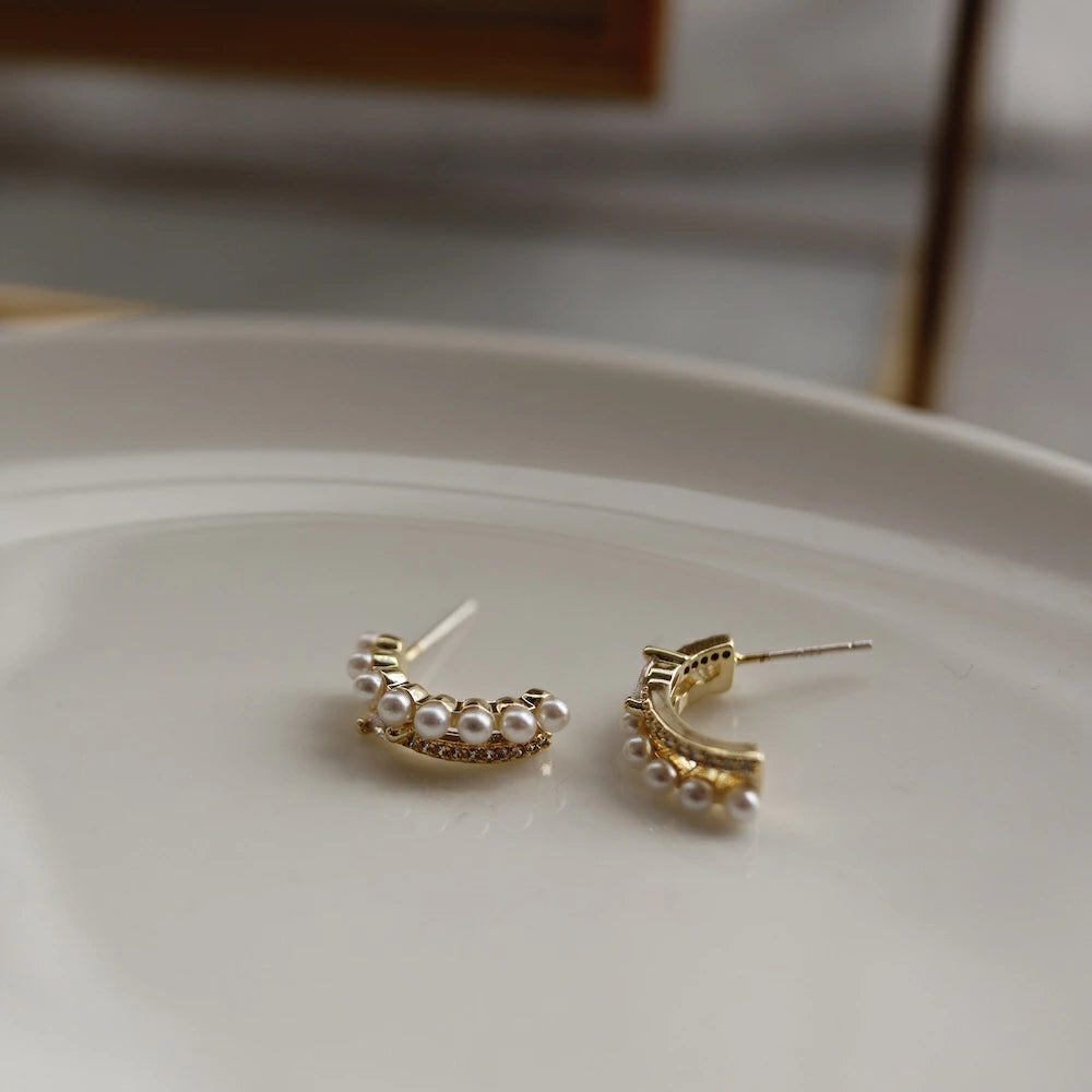 P134 zirconia and pearl half foop pierce
