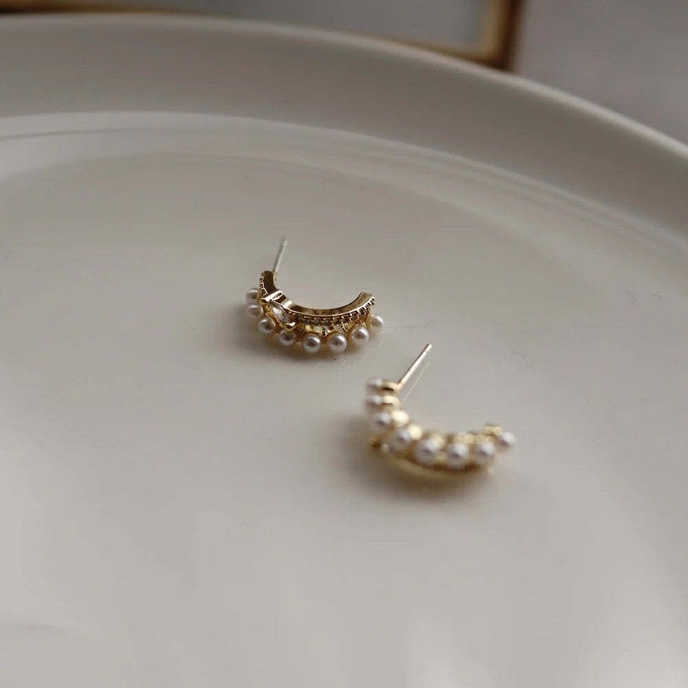 P134 zirconia and pearl half foop pierce