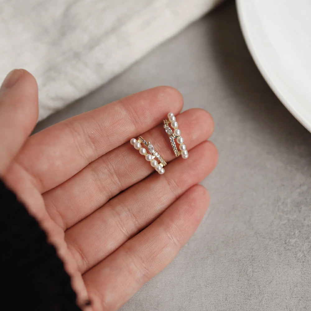 P134 zirconia and pearl half foop pierce