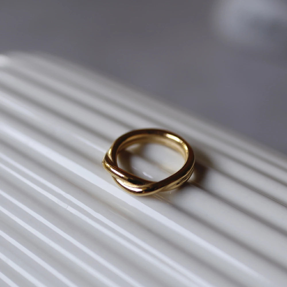 R070 stainless simple twist ring
