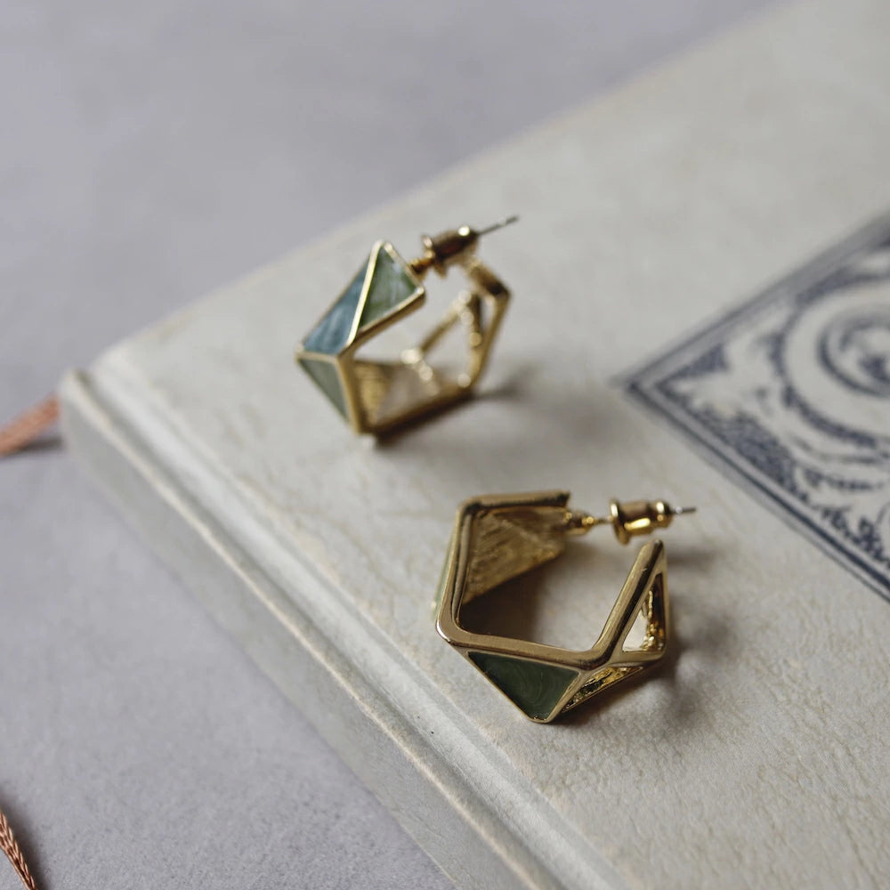 P251 geometric green hoop pierce