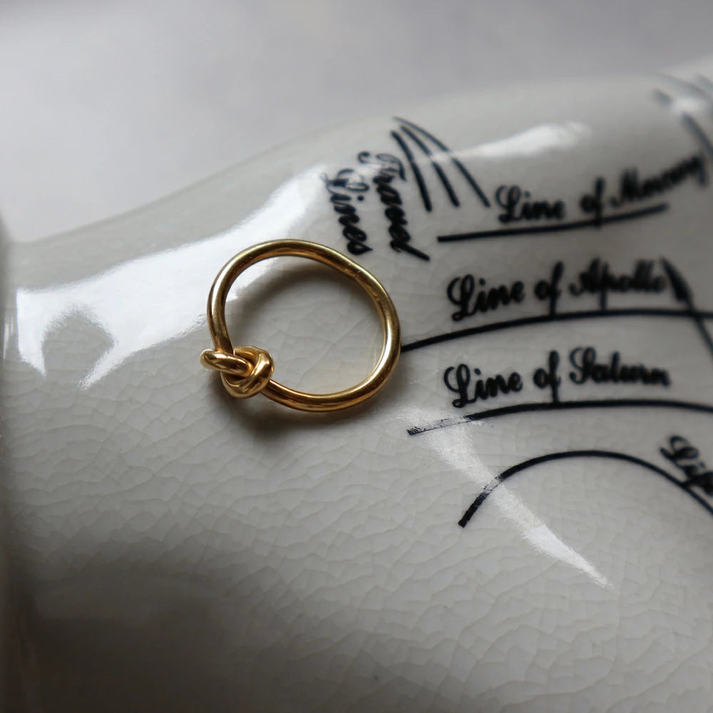 R001 stainless knot ring