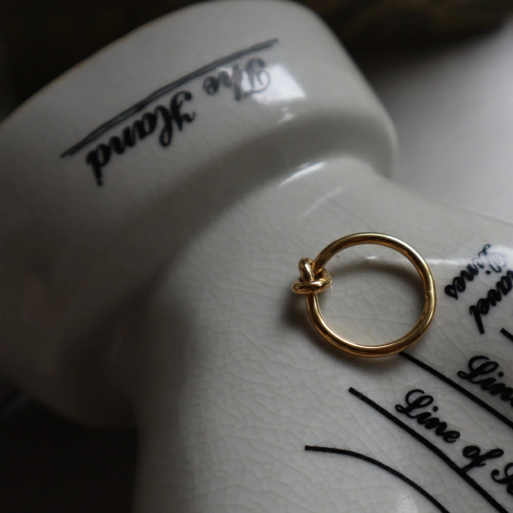 R001 stainless knot ring