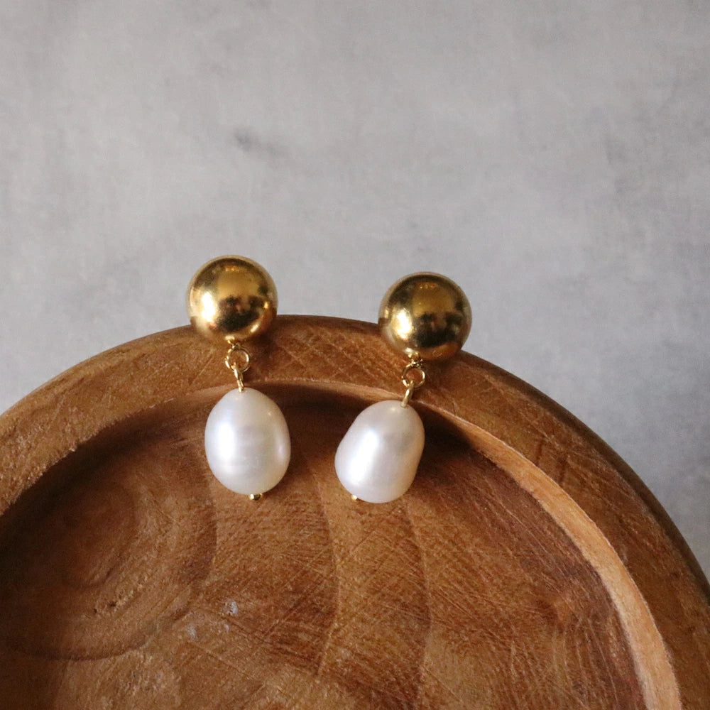 P310 stainless pearl charm pierce