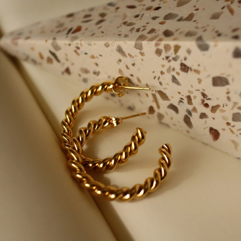P006 stainless hoop twist pierce