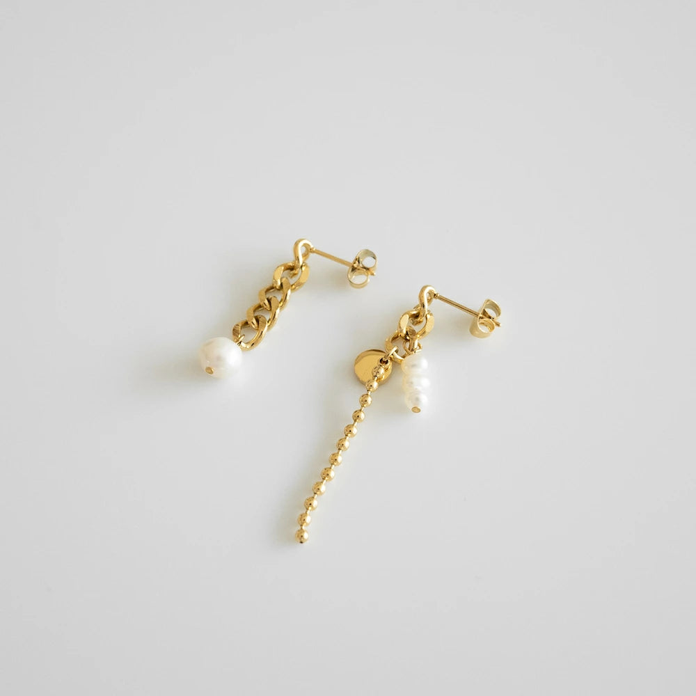 P326 stainless asymmetry pearl chain pierce