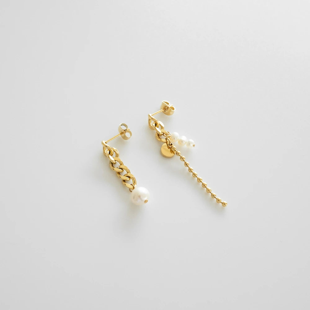 P326 stainless asymmetry pearl chain pierce