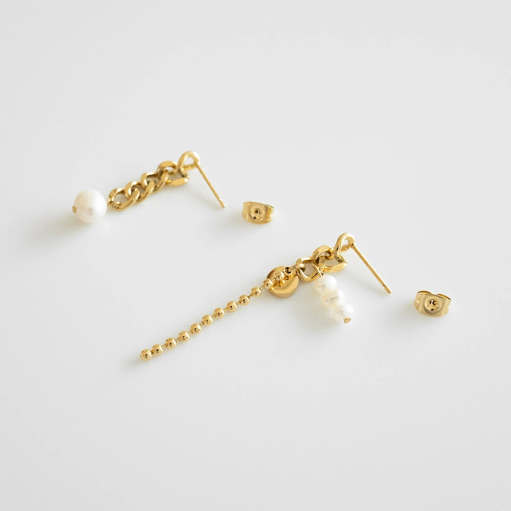 P326 stainless asymmetry pearl chain pierce