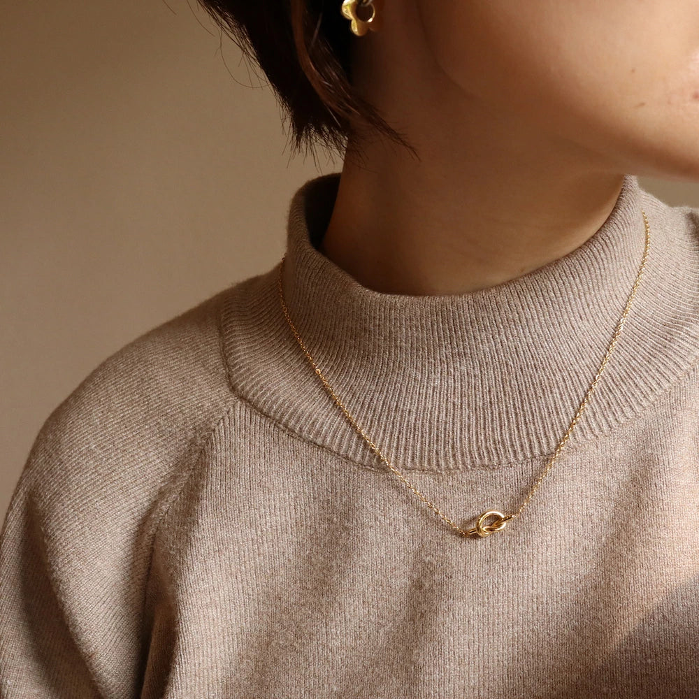 N114 stainless knot pendant