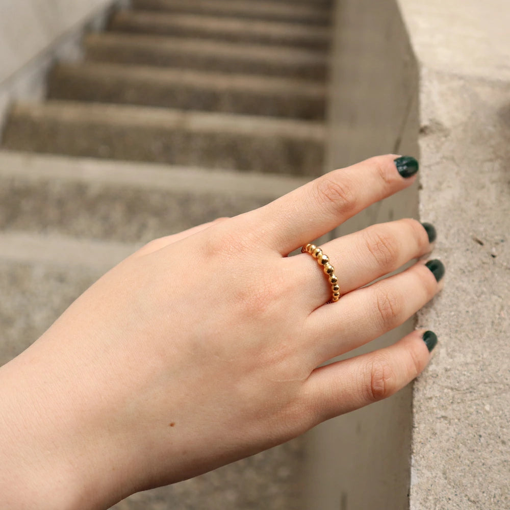 R011 stainless gold ball ring
