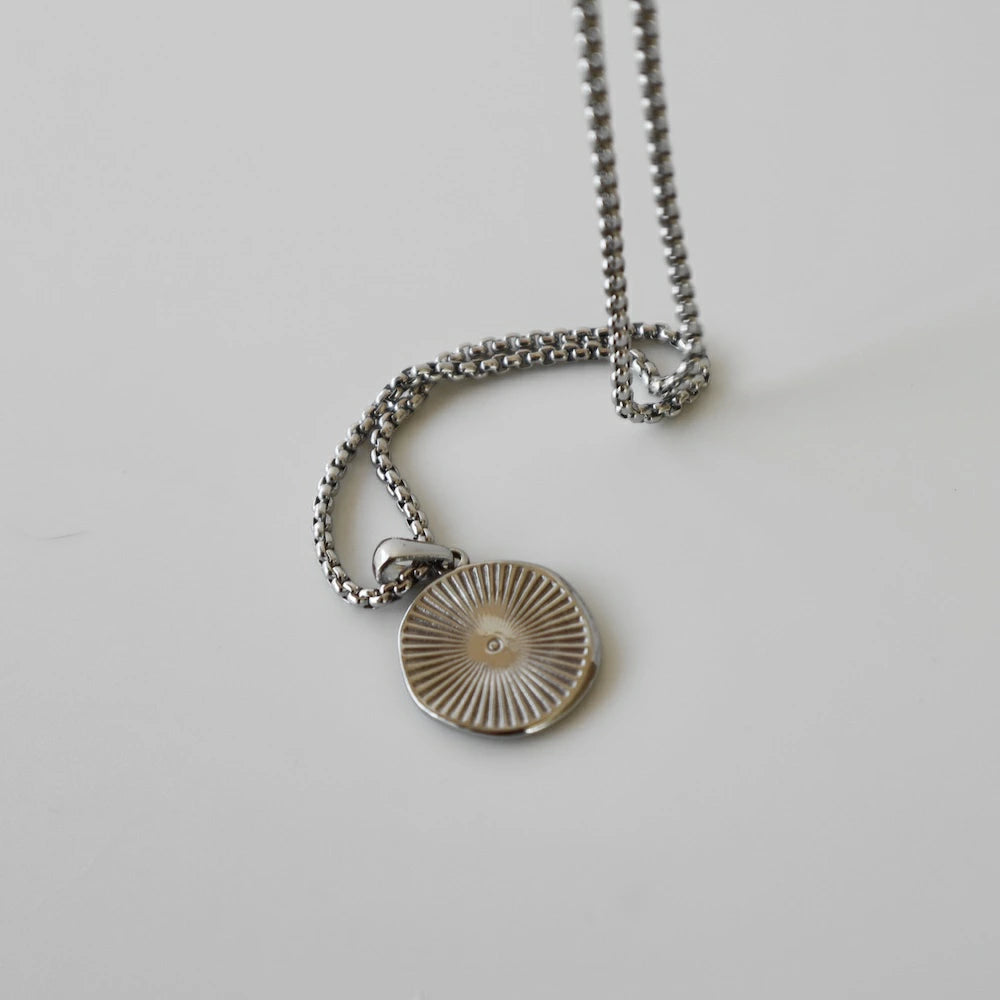 N136 stainless coin pendant
