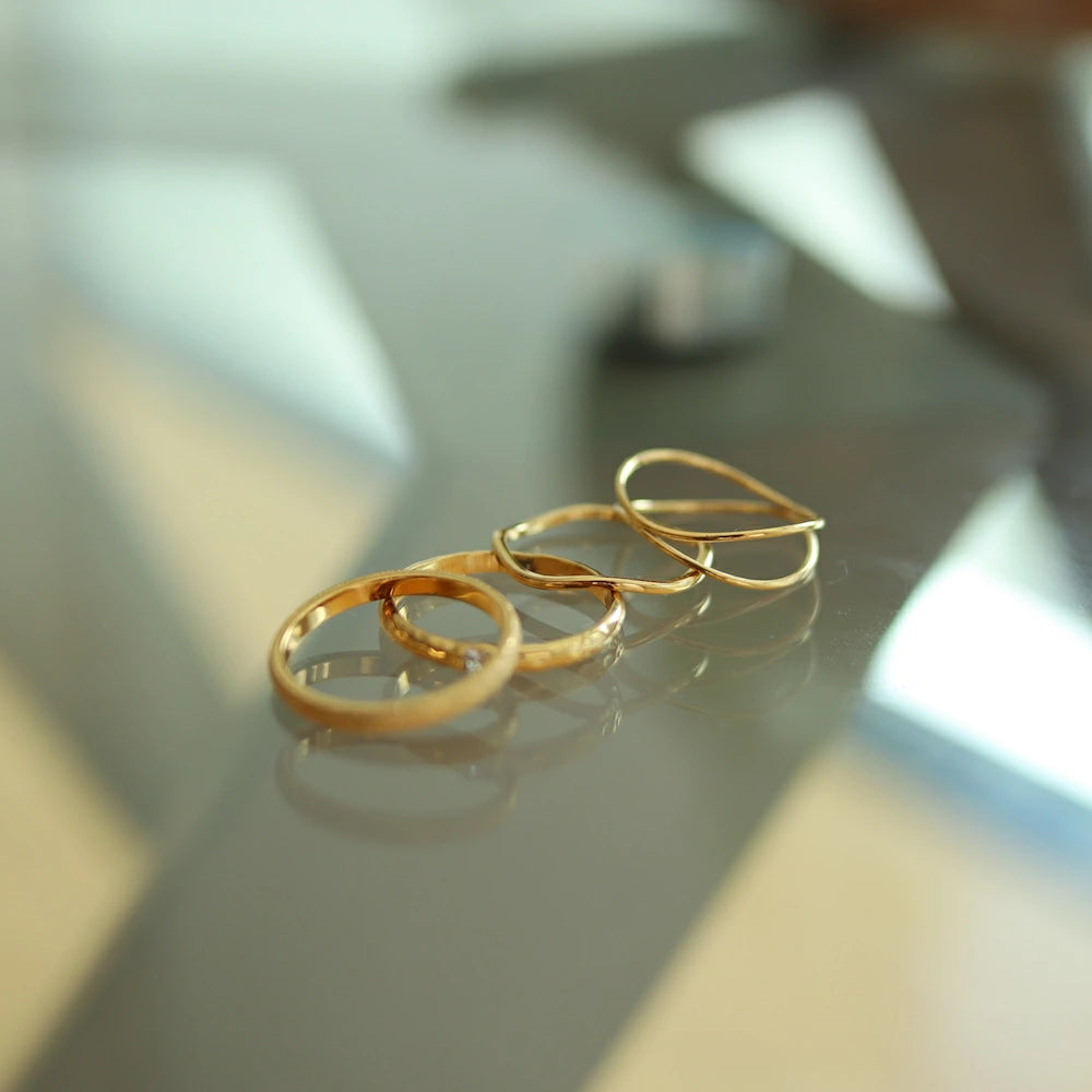 R035 stainless simple wave slim ring