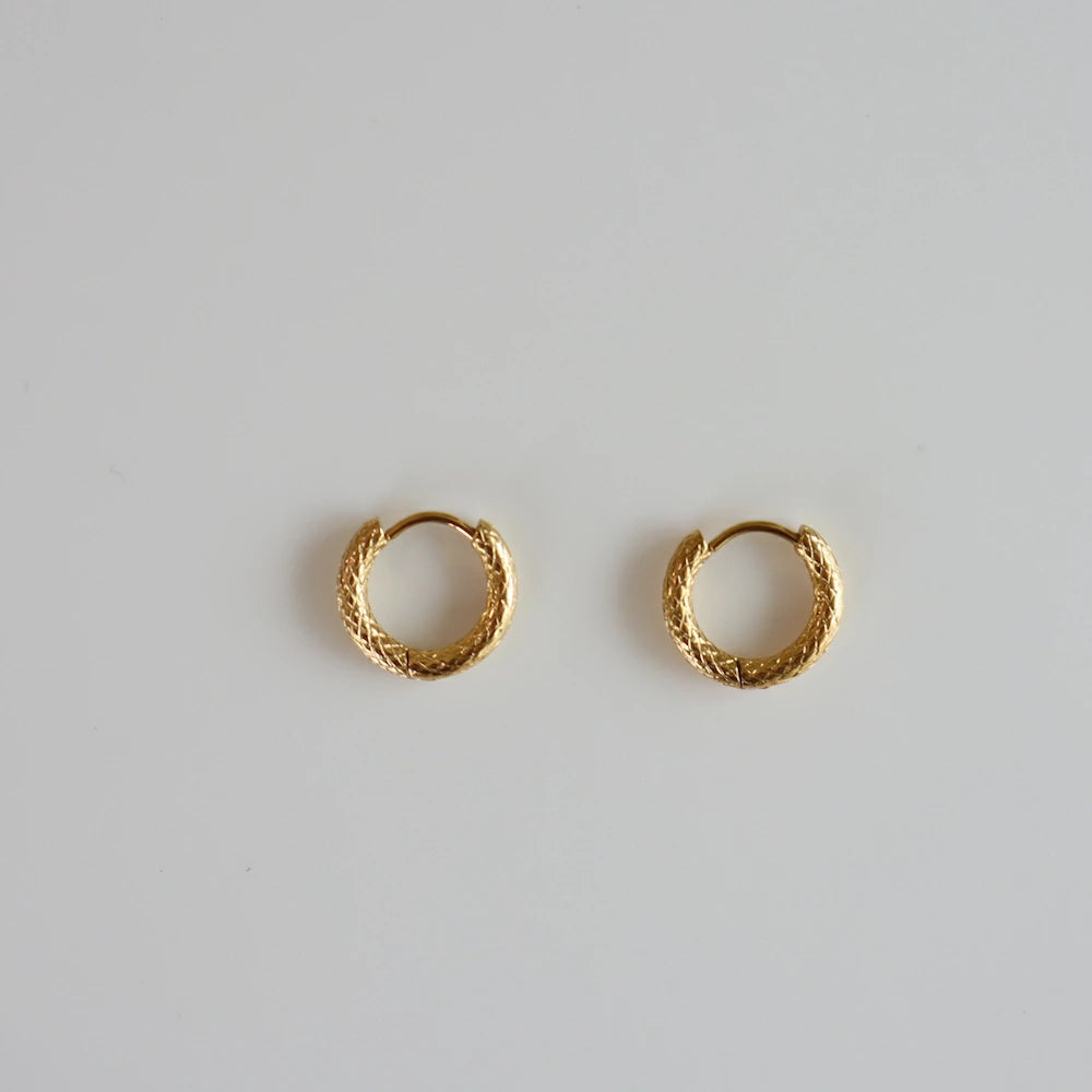 P033 stainless lattice pattern hoop pierce