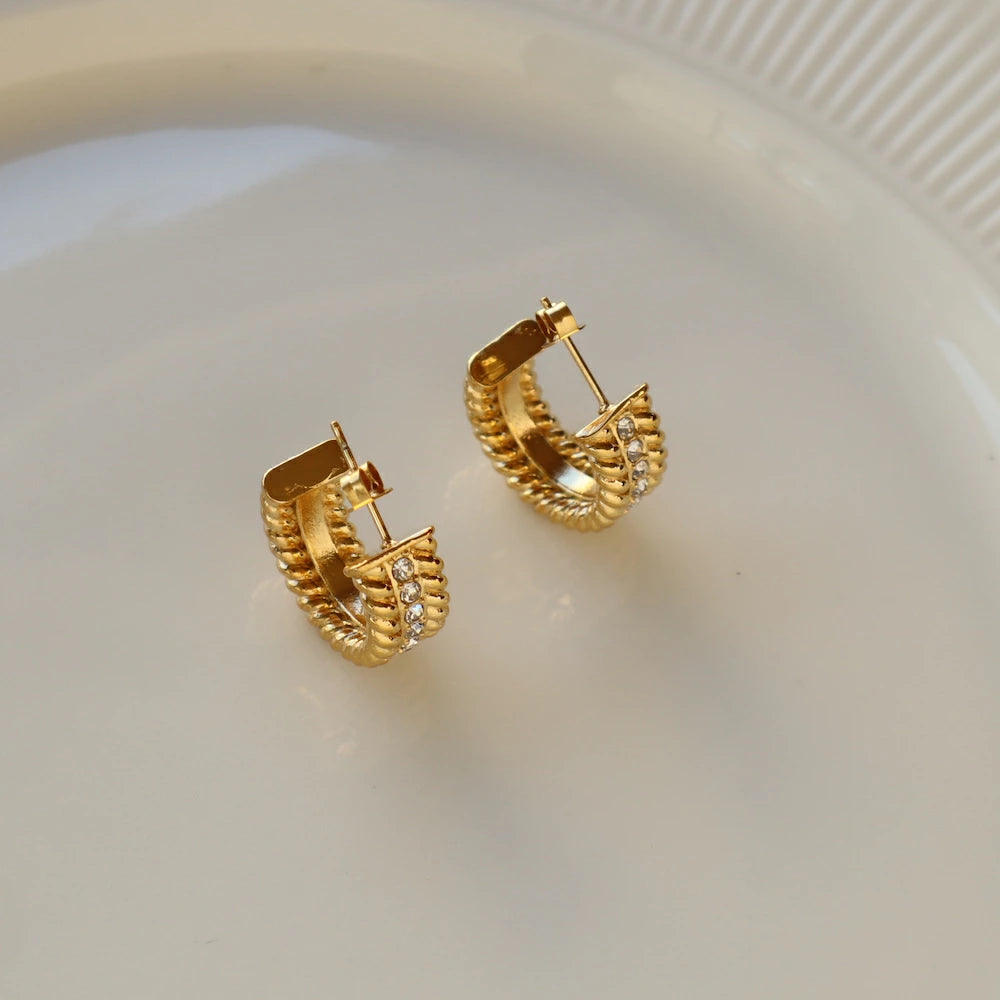 P216 stainless stone sand twist hoop pierce