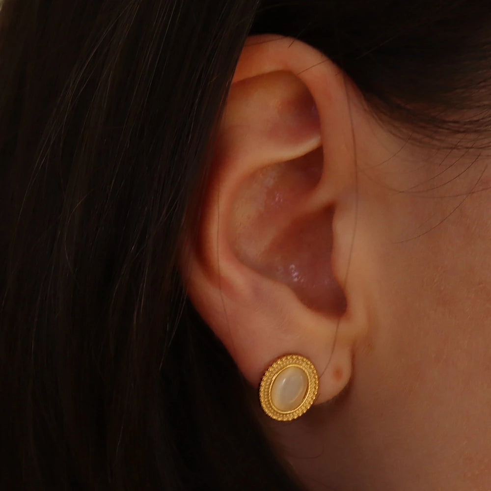 P289 stainless synthetic cateye turquoise pierce