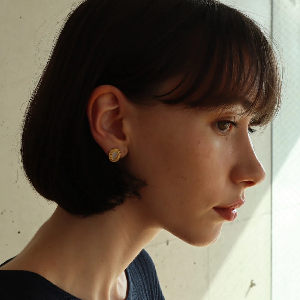 P289 stainless synthetic cateye turquoise pierce