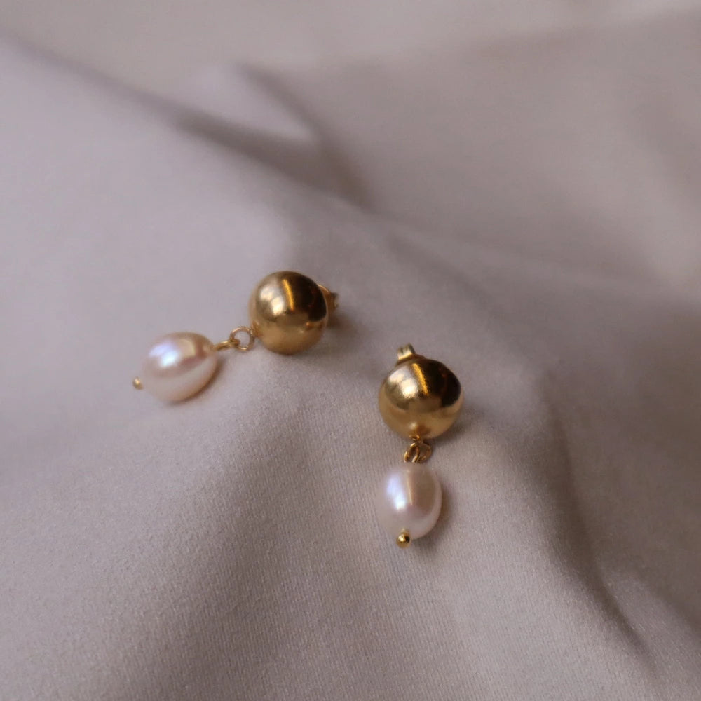 P310 stainless pearl charm pierce