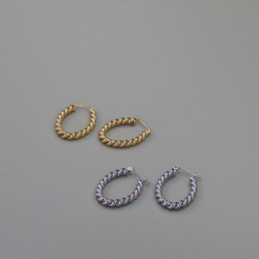 P302 stainless twist oversized hoop pierce