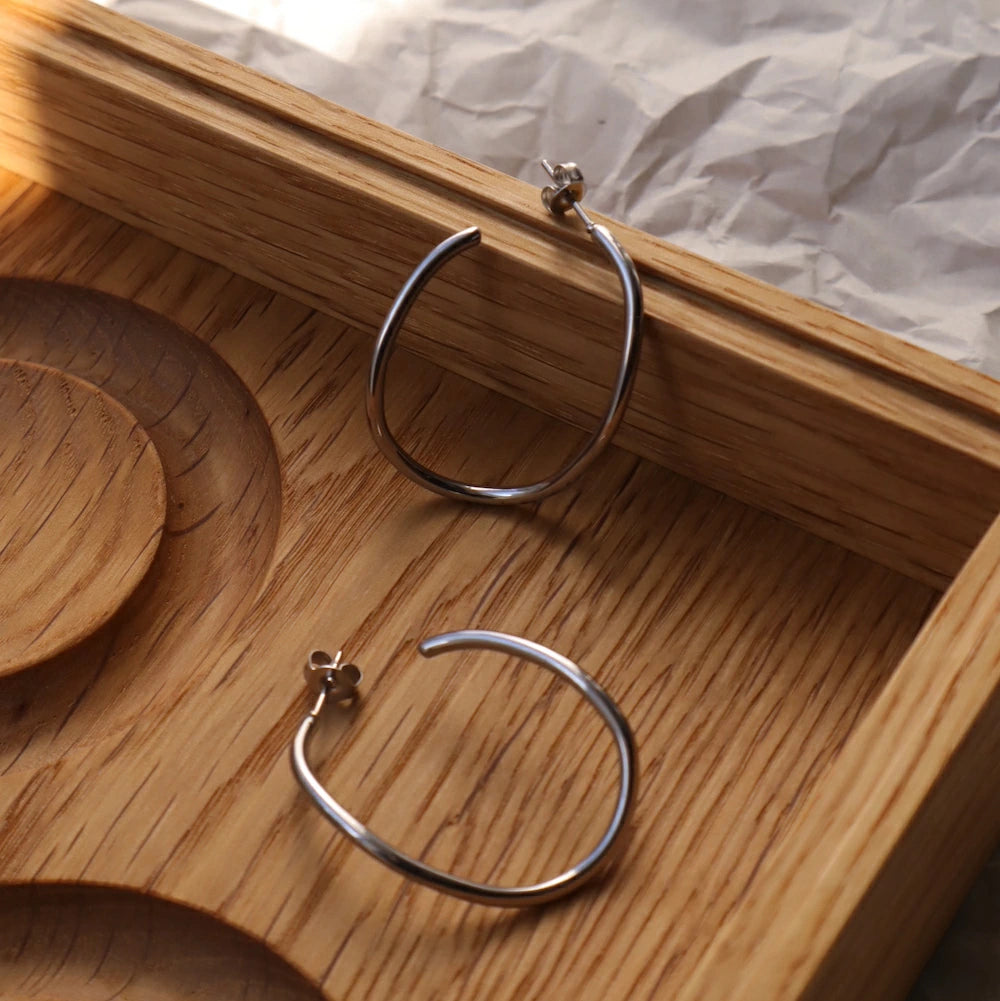 P038 stainless soft wave hoop pierce