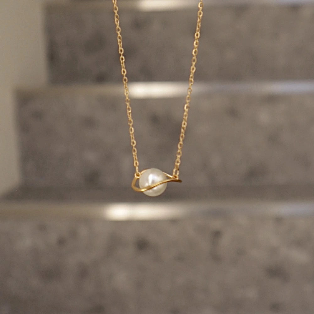 N195 stainless saturn pearl necklace