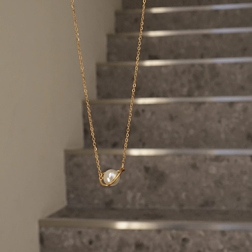 N195 stainless saturn pearl necklace