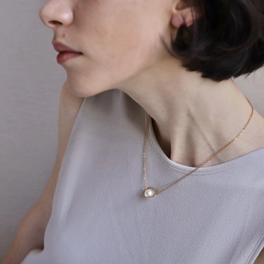 N195 stainless saturn pearl necklace