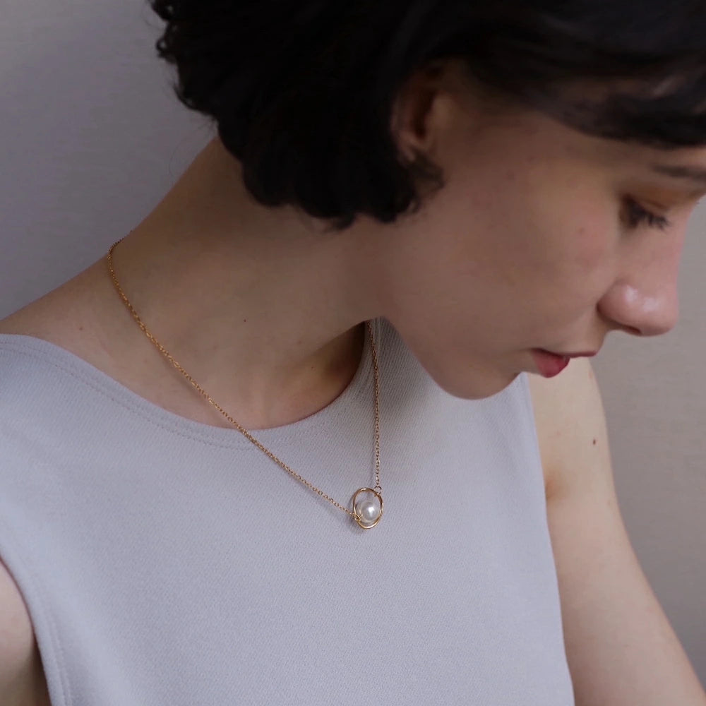 N195 stainless saturn pearl necklace