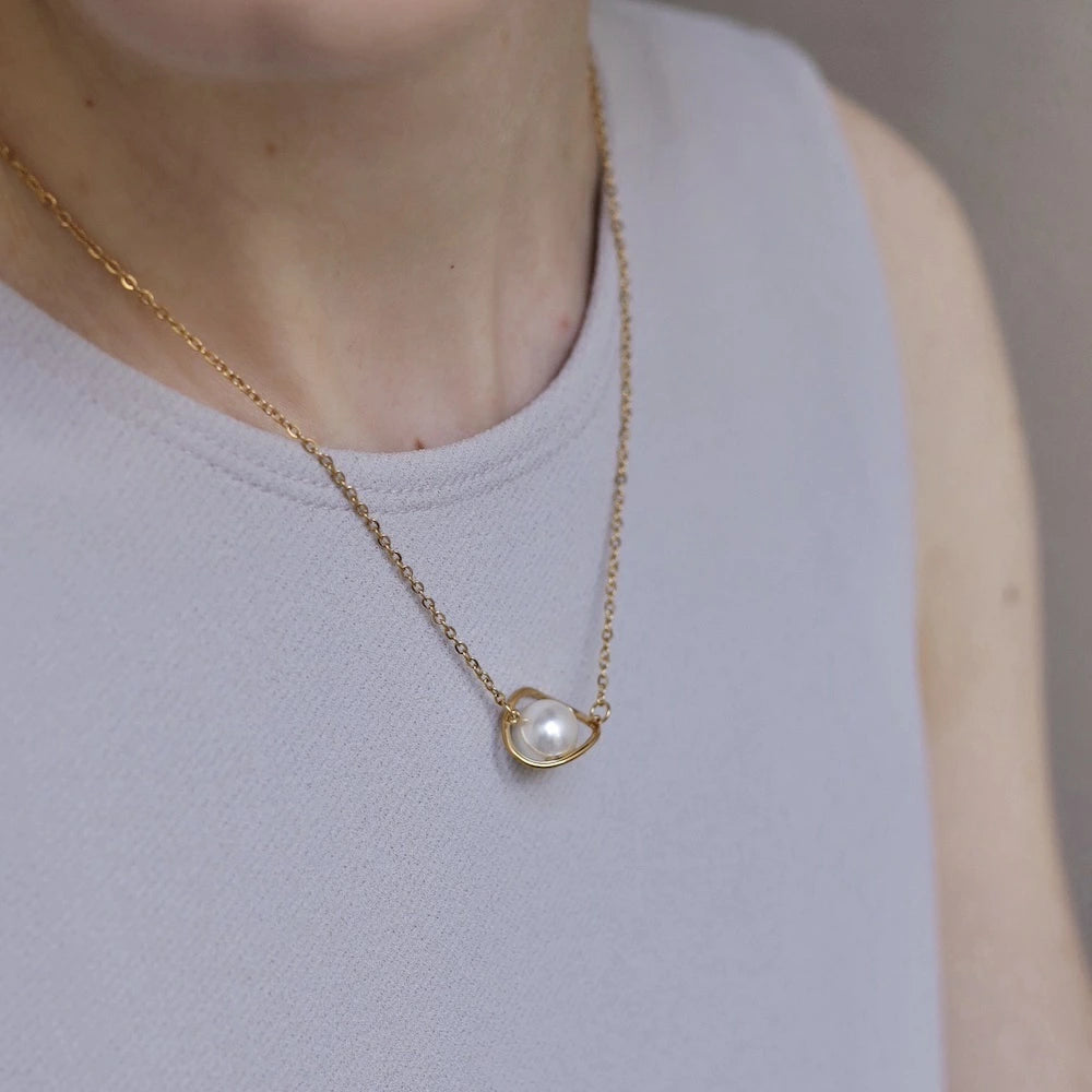 N195 stainless saturn pearl necklace