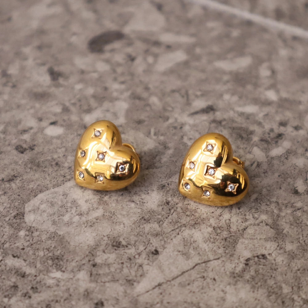 P132 stainless zirconia heart motif pierce