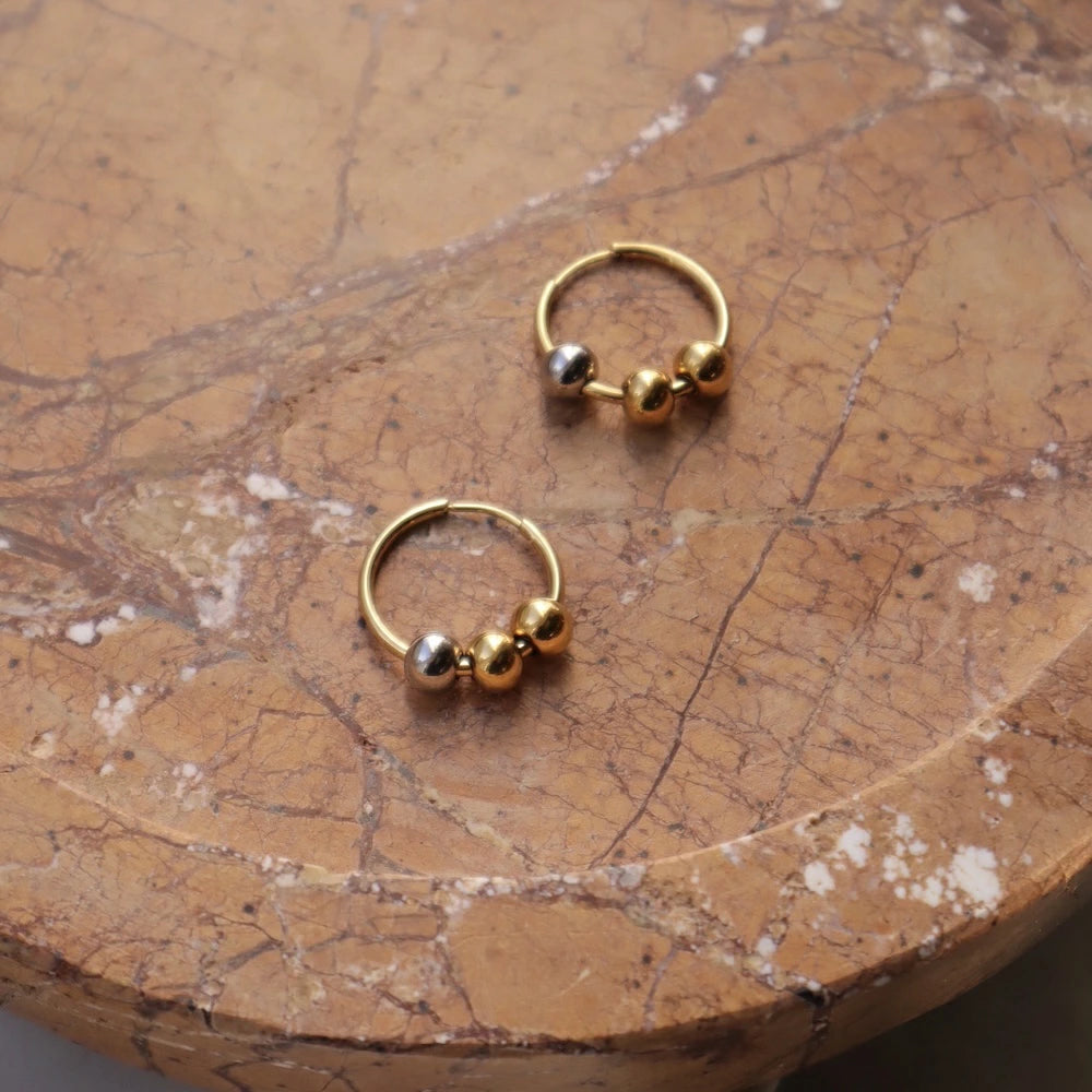 P407 stainless bi-color ball hoop pierce
