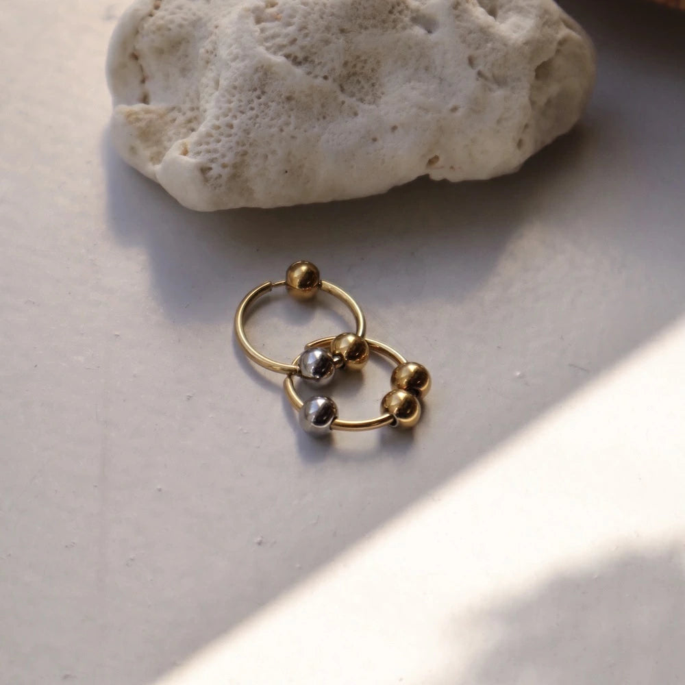 P407 stainless bi-color ball hoop pierce