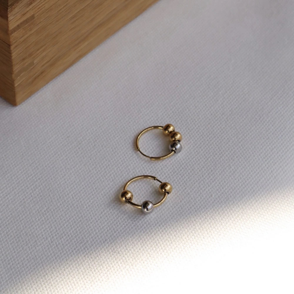 P407 stainless bi-color ball hoop pierce