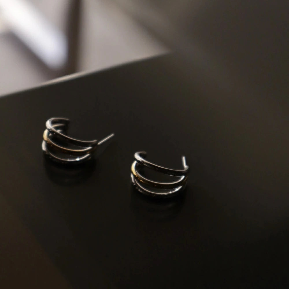 P409 stainless bi-color triple line hoop pierce