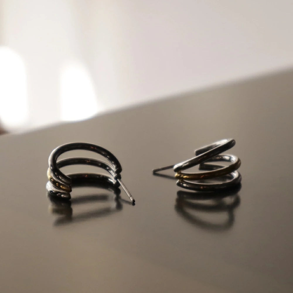 P409 stainless bi-color triple line hoop pierce