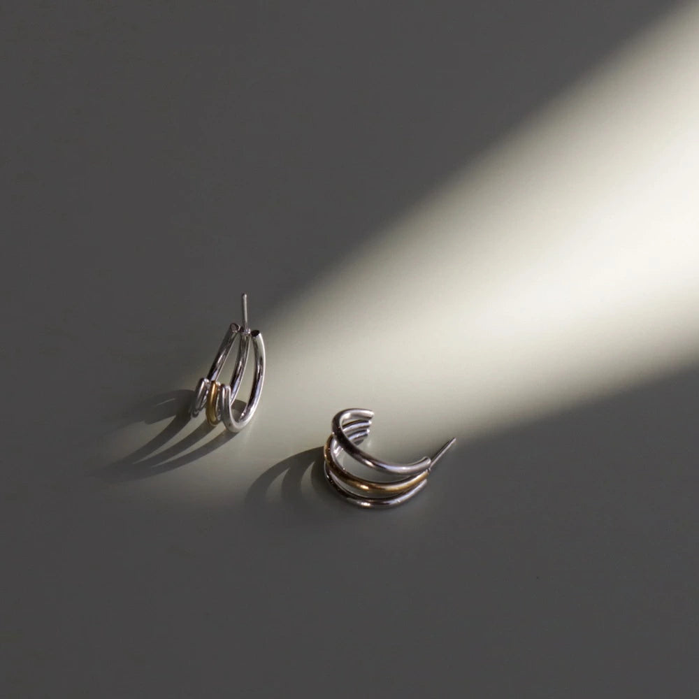 P409 stainless bi-color triple line hoop pierce