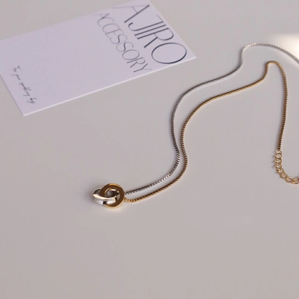 N210 stainless bi-color ring necklace