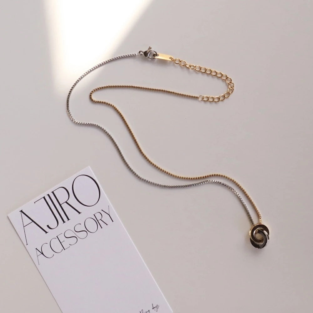 N210 stainless bi-color ring necklace