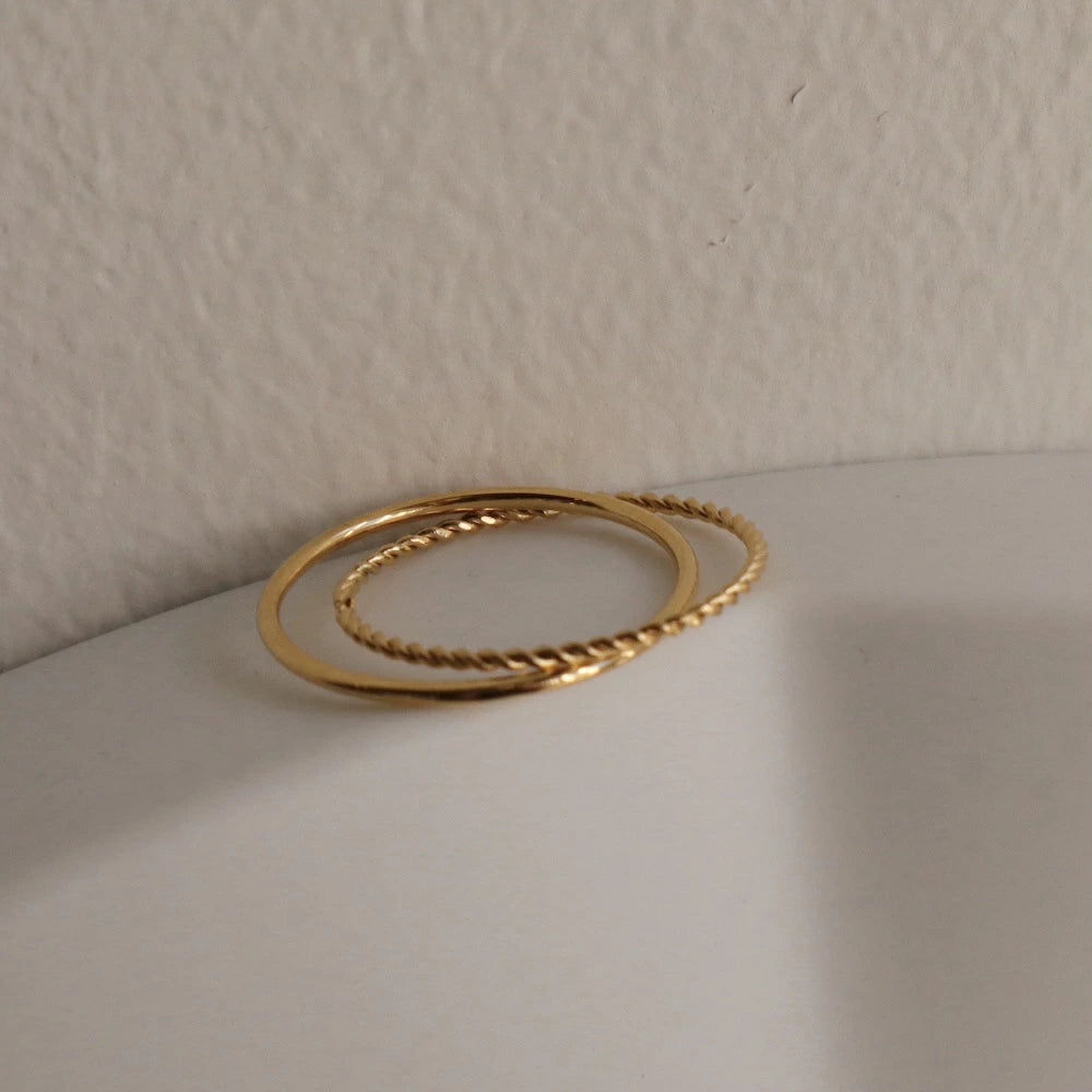 R076 stainless layered twist ring