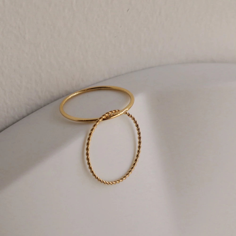 R076 stainless layered twist ring