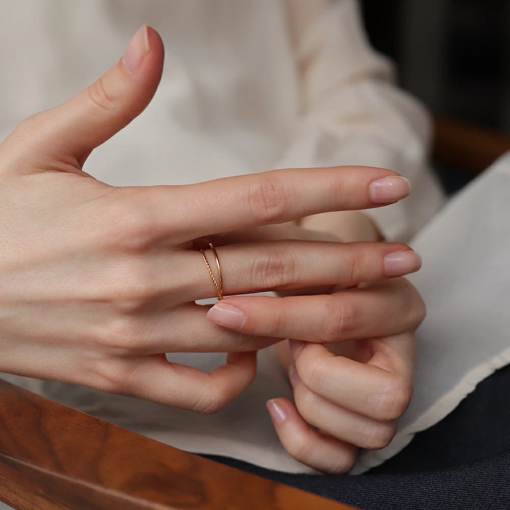 R076 stainless layered twist ring