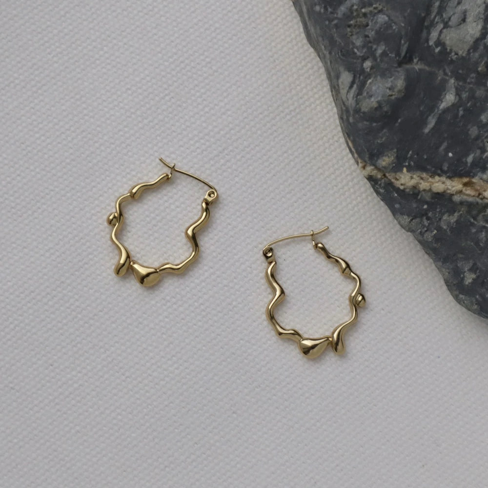 P434 stainless wave nuance hoop pierce
