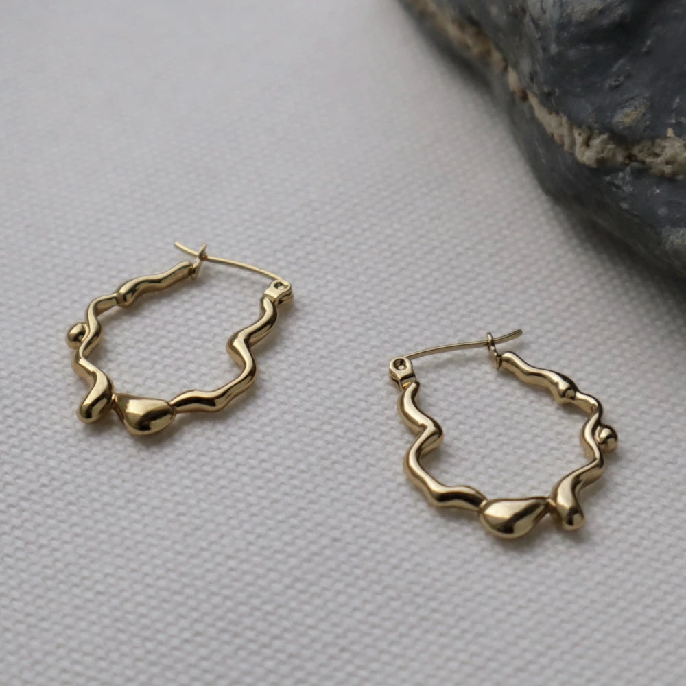 P434 stainless wave nuance hoop pierce