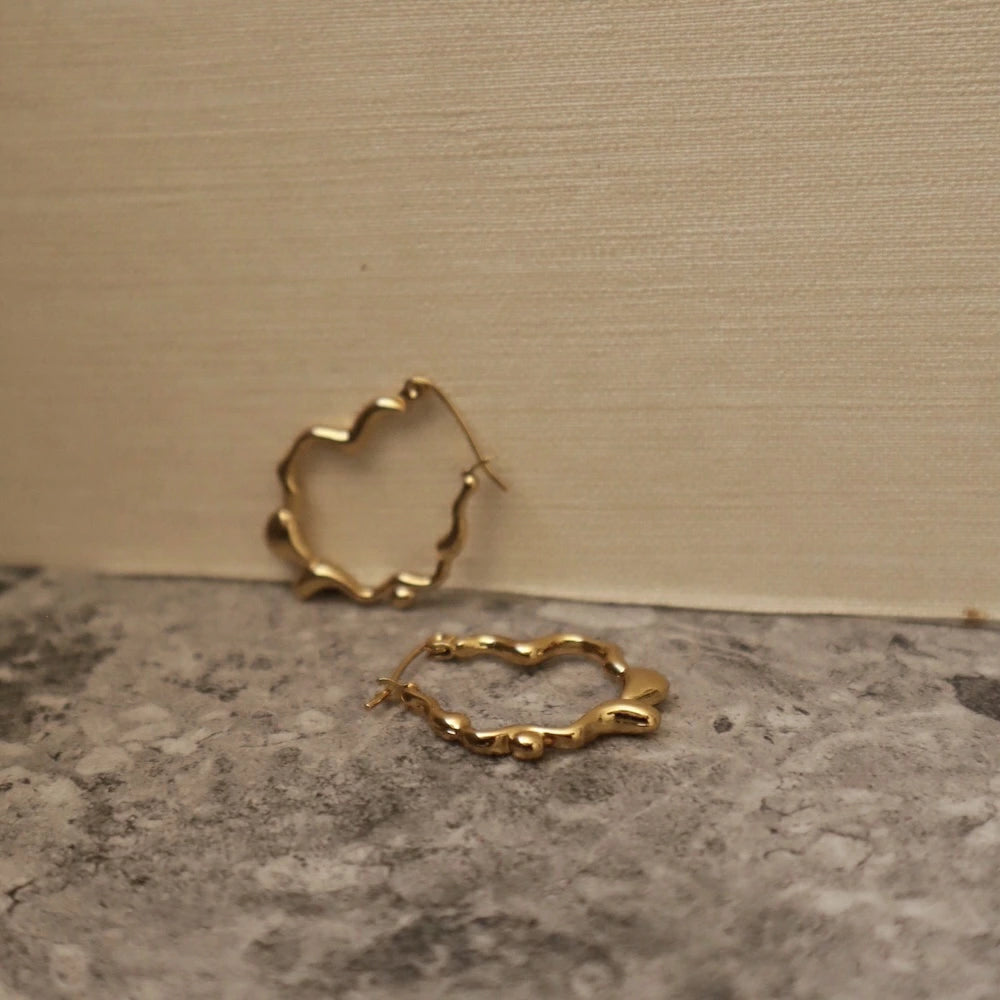 P434 stainless wave nuance hoop pierce