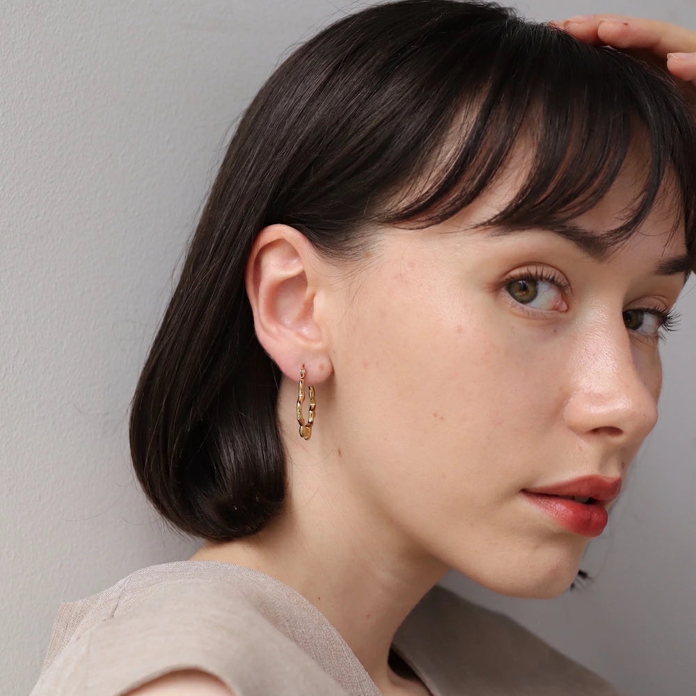 P434 stainless wave nuance hoop pierce