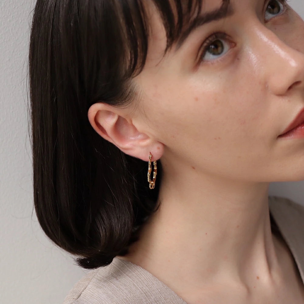 P434 stainless wave nuance hoop pierce