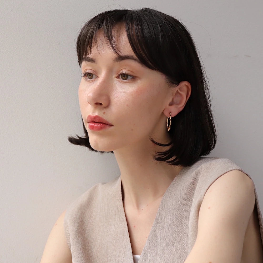P434 stainless wave nuance hoop pierce