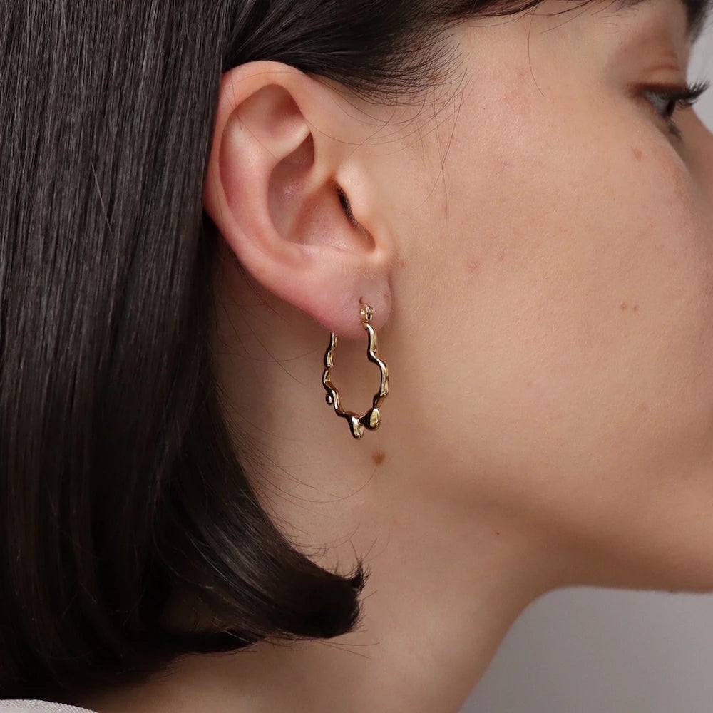 P434 stainless wave nuance hoop pierce